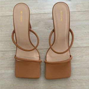 Brand new. PLT mule high heels. Size 8. Never worn.